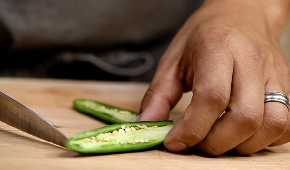 cutting a jalapeno