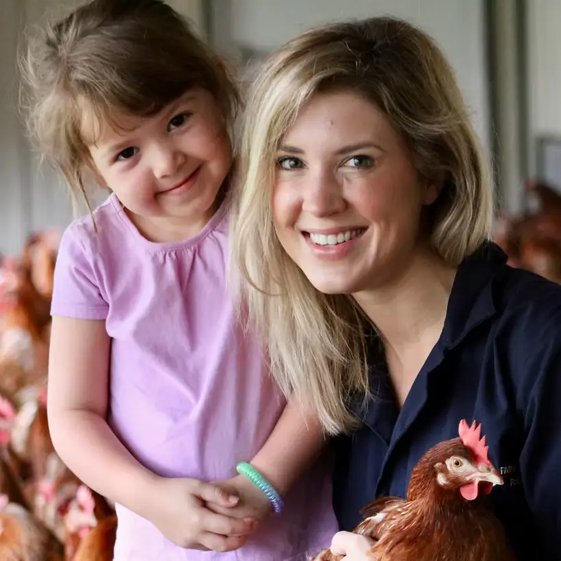 Family egg farmer with child